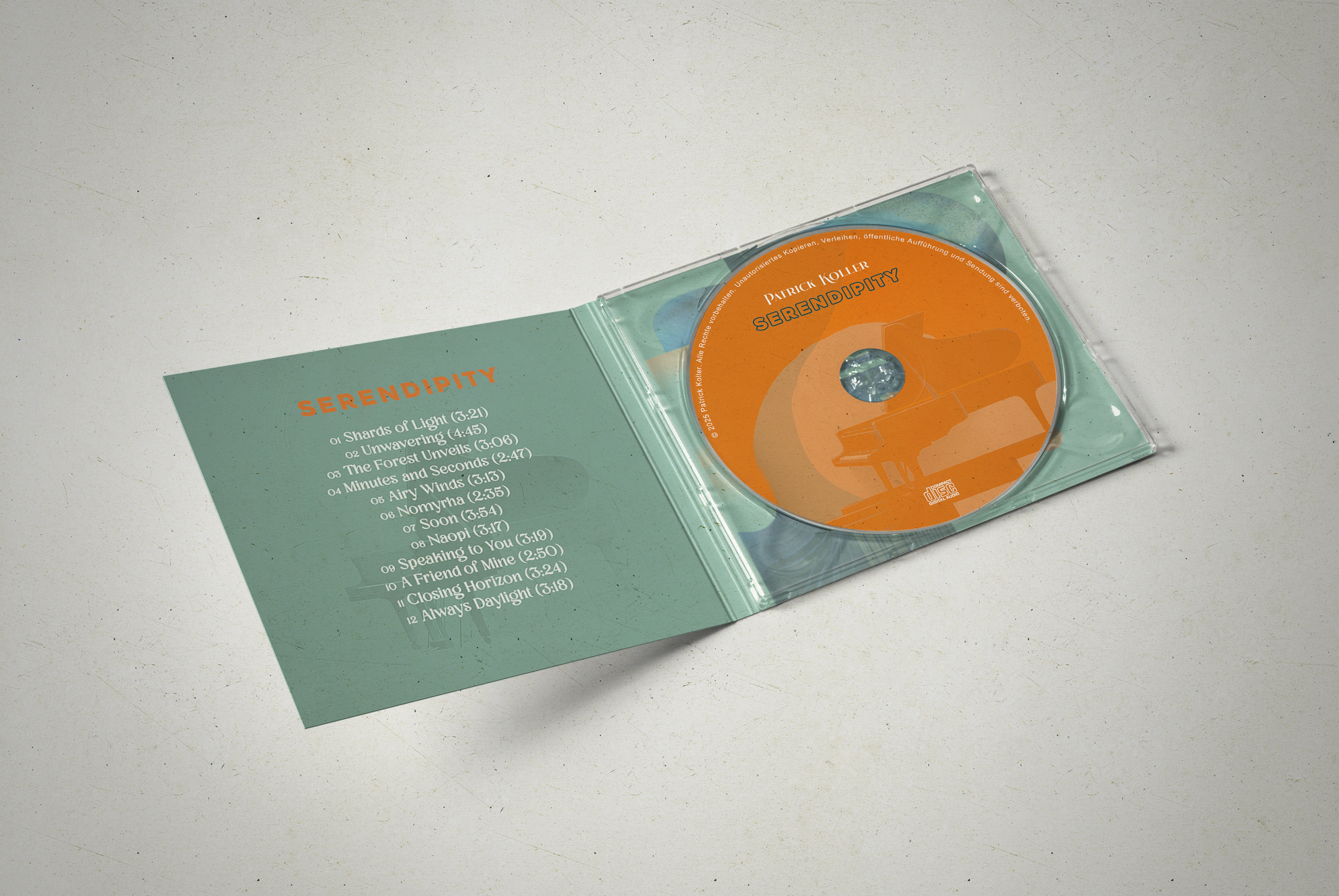 Geöffnete, gedruckte Serendipity-CD mit Booklet und orangefarbener Disc.